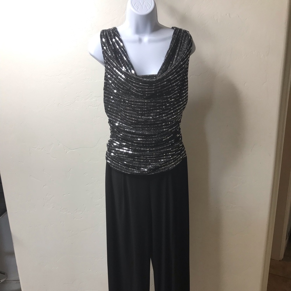 black & silver designs jump suit r & m richards